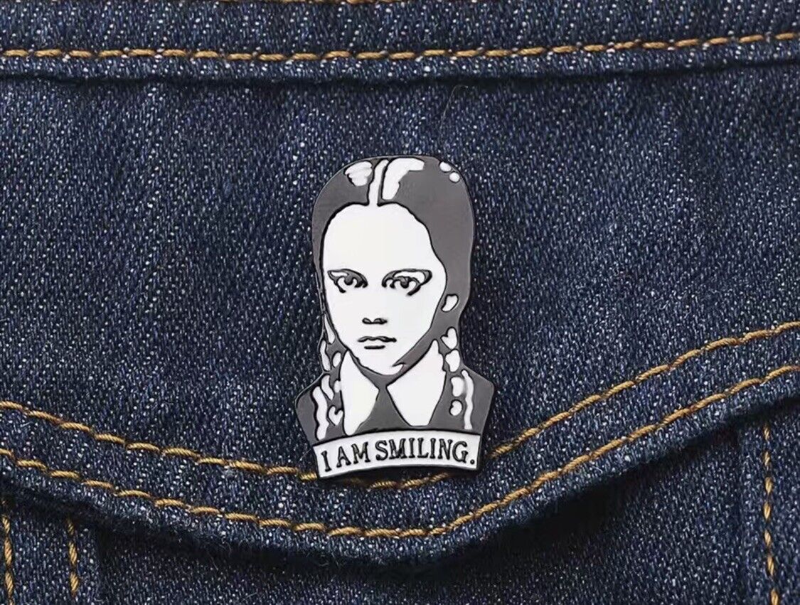 I AM SMILING Wednesday Addams Enamel Pin- Funny Gothic Tim Burton Brooch, The Addams Family, Throwback Vintage Style Art Lapel Jewelry Gift for Her - Asylum Books