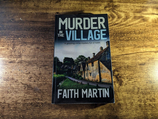 Murder in the Village by Faith Martin: New Paperback Mystery Book (Hillary Greene Mysteries) - Asylum Books