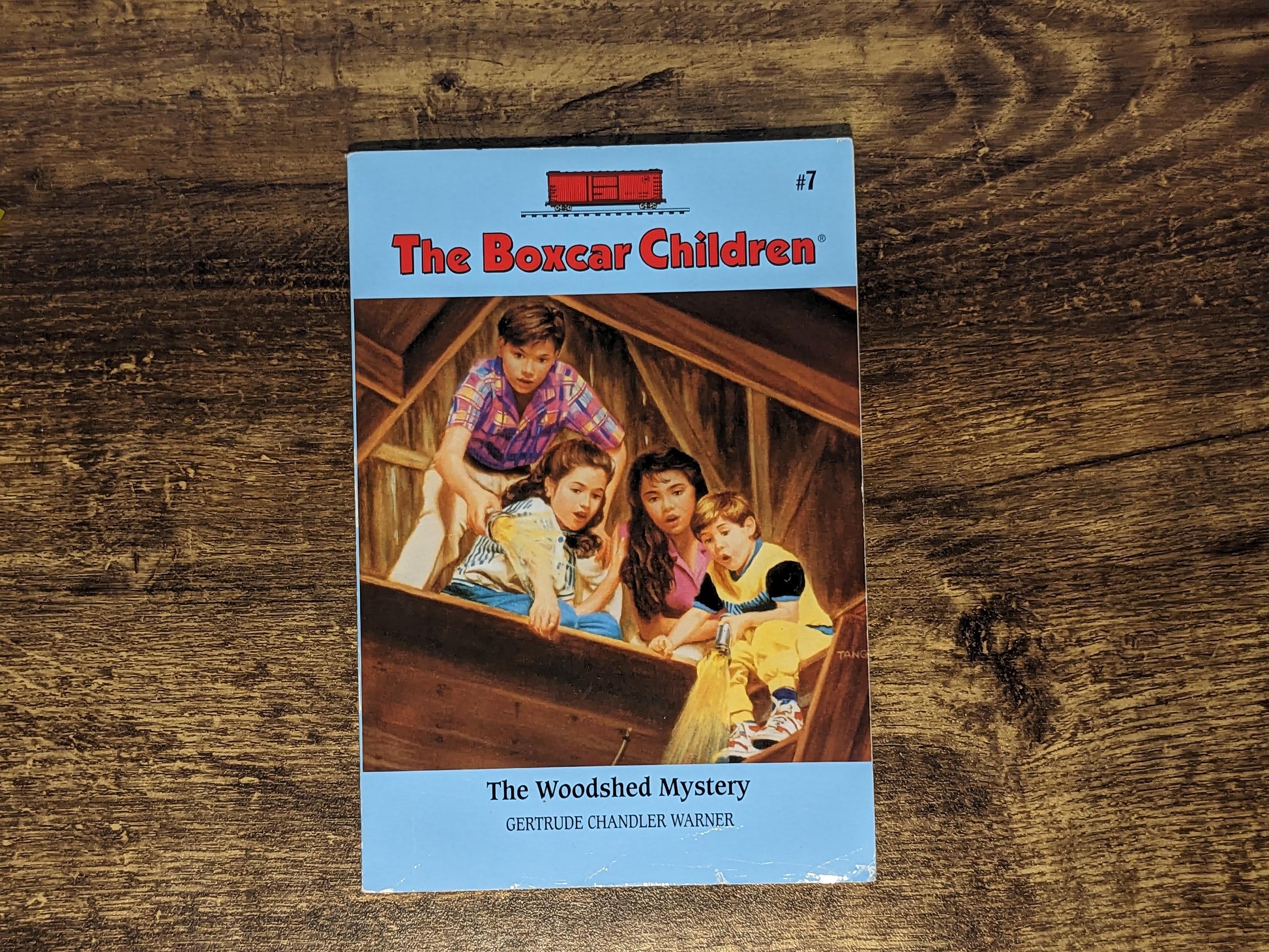 Woodshed Mystery, The (Boxcar Children Mysteries #7) by Gertrude Chandler Warner - Asylum Books